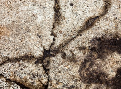 Cracked concrete surface with rich and various texture.