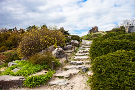 Stony stairs in the rockery in Kyiv botanical garden.