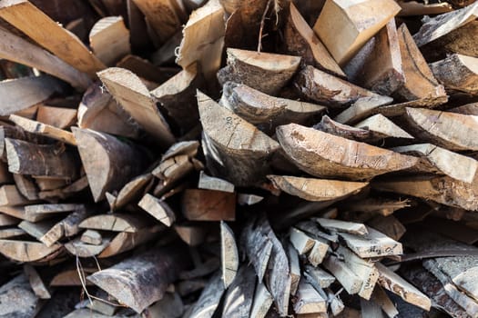 Pile of raw planks of pine wood.