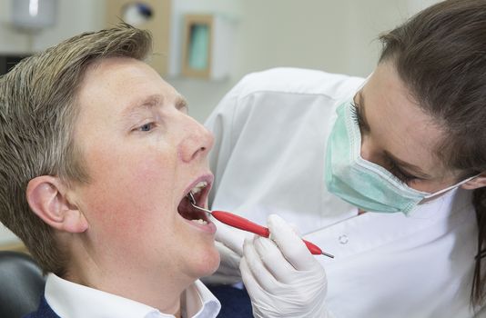 Female Dentist and Male patient