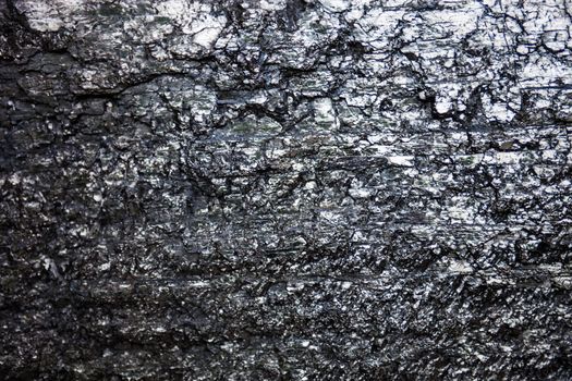 The surface of the black coal with rich texture