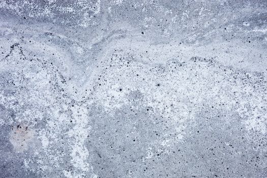 Grey concrete surface with rich and various texture. 