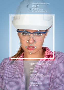Concept of person identification. Sexy builder in helmet and glasses. Face with lines, frame and text. Blue background