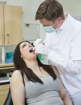 Male Dentist and female patient situation