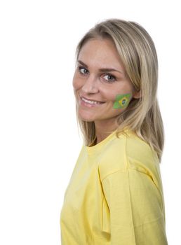 Young Girl with the Brazilian flag painted on her cheek