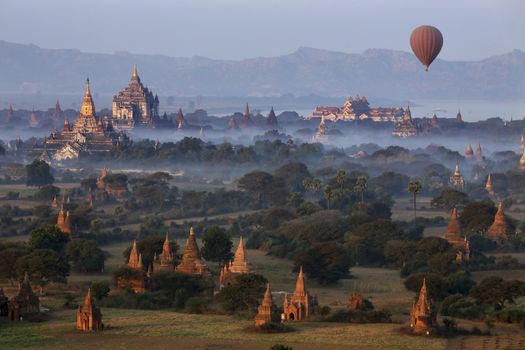 Early morning aerial view of the temples of the Archaeological Zone near the Irrawaddy River in Bagan in Myanmar (Burma).