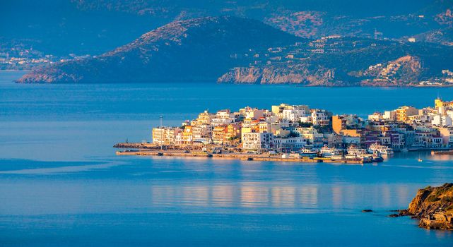 Agios Nikolaos, Crete, Greece. Agios Nikolaos is a picturesque town in the eastern part of the island Crete built on the northwest side of the peaceful bay of Mirabello.���
