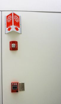 Fire alarm system in hospital, red color, emergency sign for fire alertness.                             