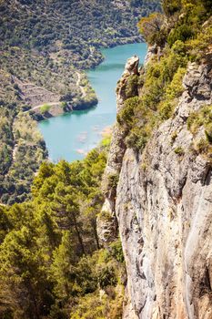 View of cliff and river flowing below near Siurana village in the province of Tarragona, Spain