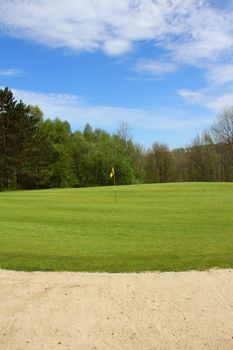 Sand bunkers on the golf course at french resort. Saint Saens