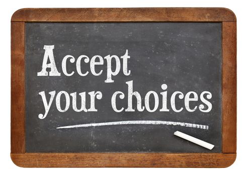 Accept your choices - motivational words on a vintage slate blackboard