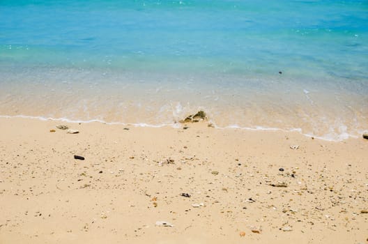 Beach sand and blue sea in Thailand