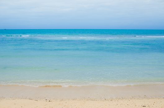 Beach sand and blue sea in Thailand