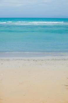 Beach sand and blue sea in Thailand