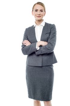 Smiling business woman with folded arms