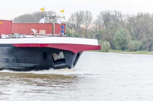 Front view of a large inland vessel on the Rhine.