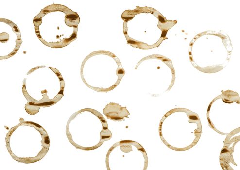 Lot of circle shape coffee stains on white background.