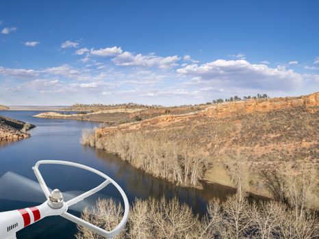 rotating drone propeller and aerial view of Horsetooth Reservoir near Fort Collins Colorado, in early spring with high water level