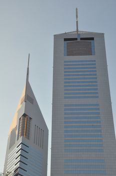 Emirates Towers in Dubai, United Arab Emirates (UAE). The complex contains the Emirates Office Tower and Jumeirah Emirates Towers Hotel, rising to 355 m and 309 m, respectively.