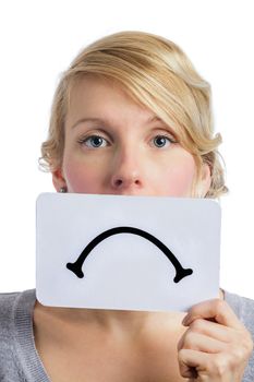 Unhappy Portrait of a Woman Holding a Sad Mood Board Isolated on white Background