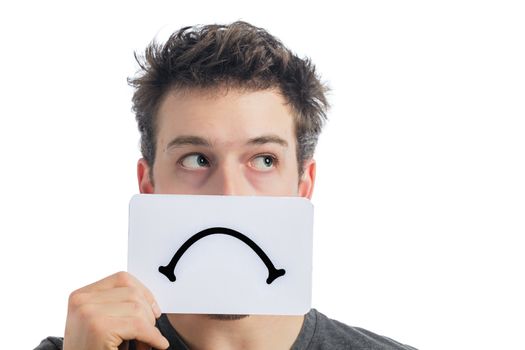 Unhappy Portrait of a Man Holding a Sad Mood Board Isolated on White Background