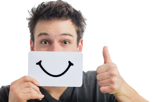 Happy Portrait of a Man Holding a Smiling Mood Board Isolated on White Background