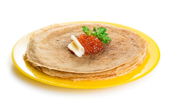 Pancakes with red caviar isolated on white background