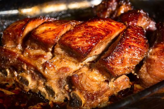Close up view of a group of delicious cooked marinated ribs