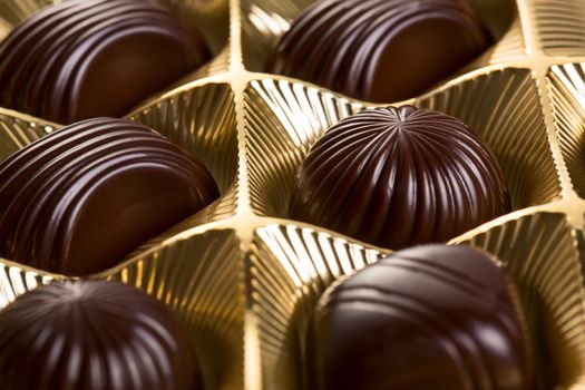 A box of various chocolate candies