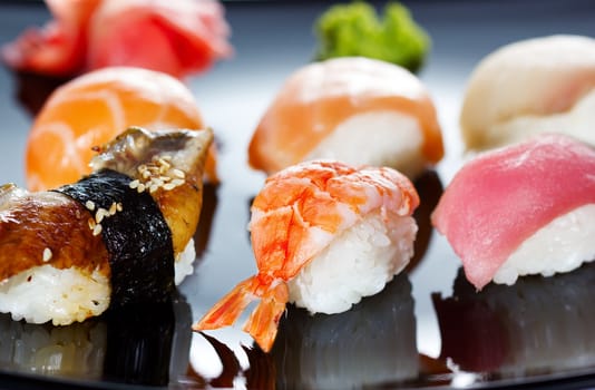 Japanese Cuisine - Sushi Set on black plate