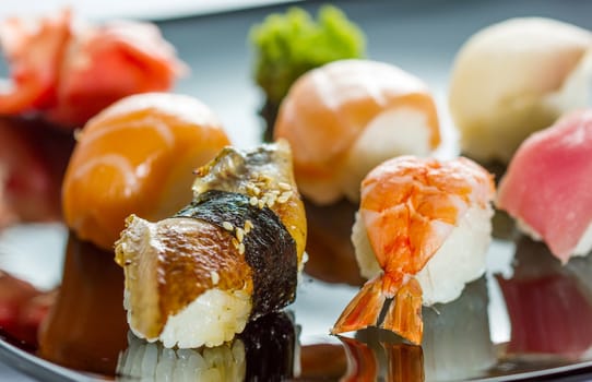 Japanese Cuisine - Sushi Set on black plate