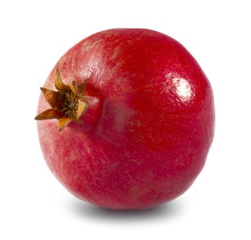 Whole pomegranate isolated on white
