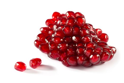 Ripe pomegranate piece isolated on white