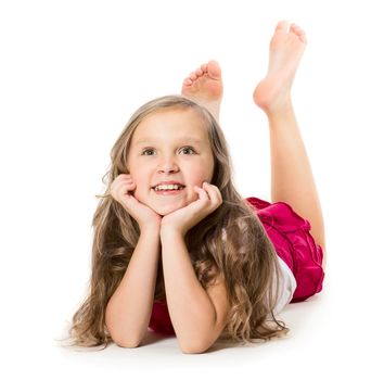 Portrait of a little girl laying on floor, isolated on white background 