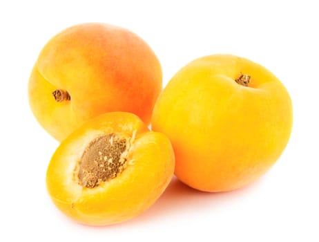 Ripe apricots isolated on white background