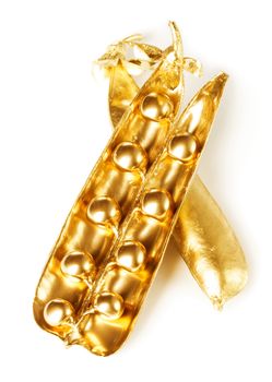 Gold pea pod isolated on white