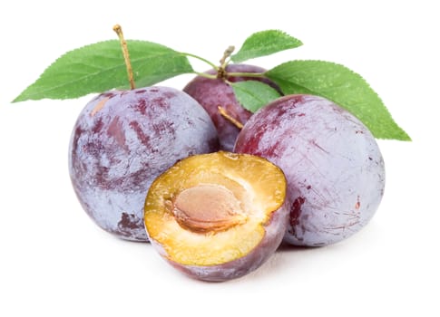 Plums and a half with leaves