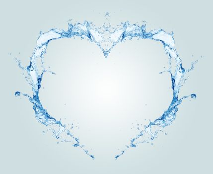 Water heart isolated on light blue background