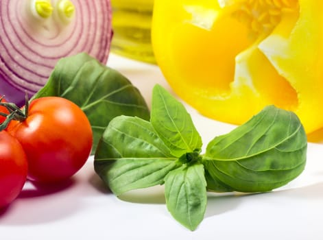 Close-up of basil herb with vegetables
