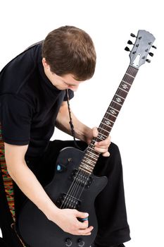 young man with an electric guitar. Isolated on white background