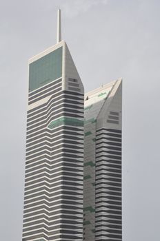 Acico Twin Towers along Sheikh Zayed Road in Dubai, UAE. Nikko Hotel Dubai (JAL Hotel) is the taller tower and Acico Office Tower (Nassima Tower) is shorter.