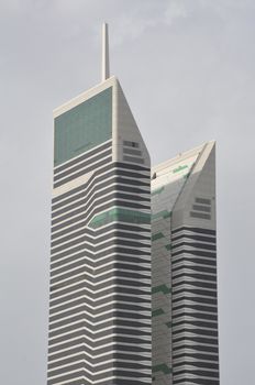 Acico Twin Towers along Sheikh Zayed Road in Dubai, UAE. Nikko Hotel Dubai (JAL Hotel) is the taller tower and Acico Office Tower (Nassima Tower) is shorter.