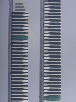 Acico Twin Towers along Sheikh Zayed Road in Dubai, UAE. Nikko Hotel Dubai (JAL Hotel) is the taller tower and Acico Office Tower (Nassima Tower) is shorter.