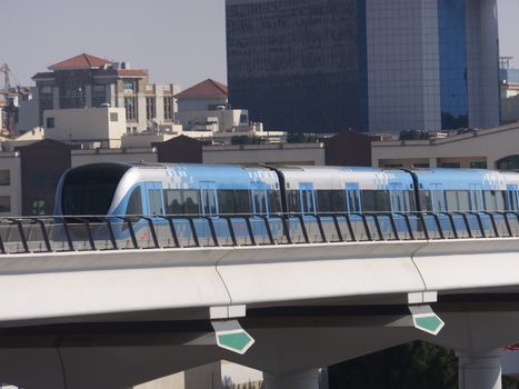 Train approaching Oud Metha Metro Station in Dubai, UAE. Guinness World Records declared it the worlds longest fully automated driverless metro network.