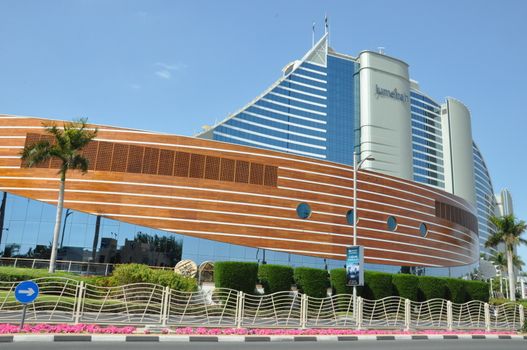 Jumeirah Beach Hotel in Dubai, UAE. This wave-shaped hotel complements the sail-shaped Burj Al Arab, which is adjacent to it.