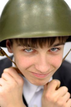 Cheerful Teenager in Military Helmet Portrait closeup