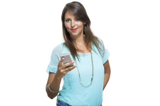 Portrait of Pretty Happy Woman in Casual Clothing Looking Something at her Mobile Phone on Hand. Captures in Studio with White Background.