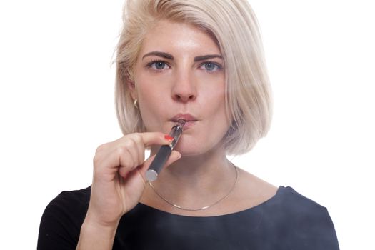 Close up Serious Facial Expression of a Young Blond Woman Smoking Using E- Cigarette on a White Background