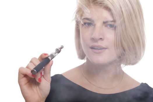 Close up Serious Facial Expression of a Young Blond Woman Smoking Using E- Cigarette on a White Background