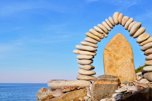 Stones laid out in the form of a arch on the coast